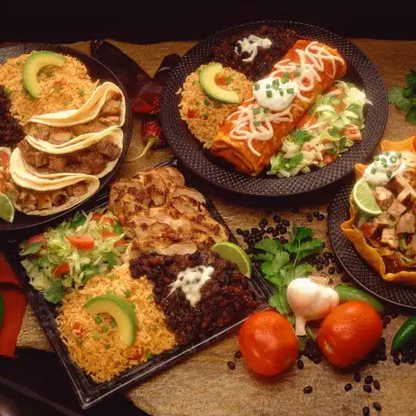 An image of a corporate event with Mexican food stations