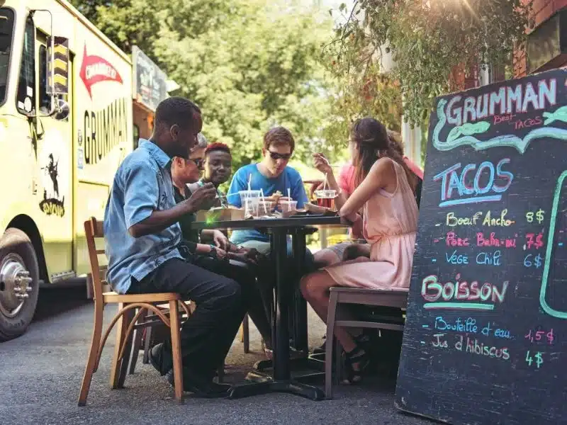 An image showing a food truck serving BBQ