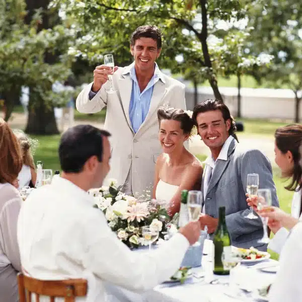 An image showing a happy couple enjoying BBQ catering at their wedding reception in Sacramento_png