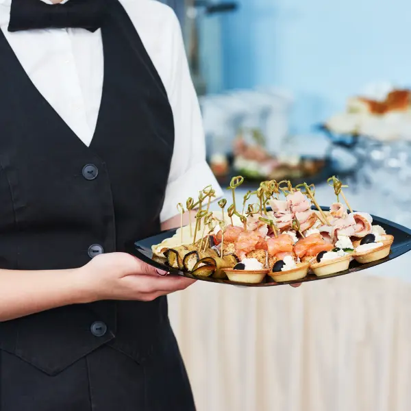 Picture of a professional catering staff serving at a Sacramento event.